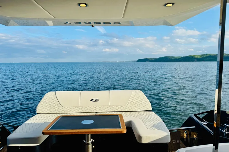 Custom Order Your 52 Fly Today! Yacht Photos Pics Luxurious Cobrey 52 FLY yacht interior with ocean view, 2026 model.