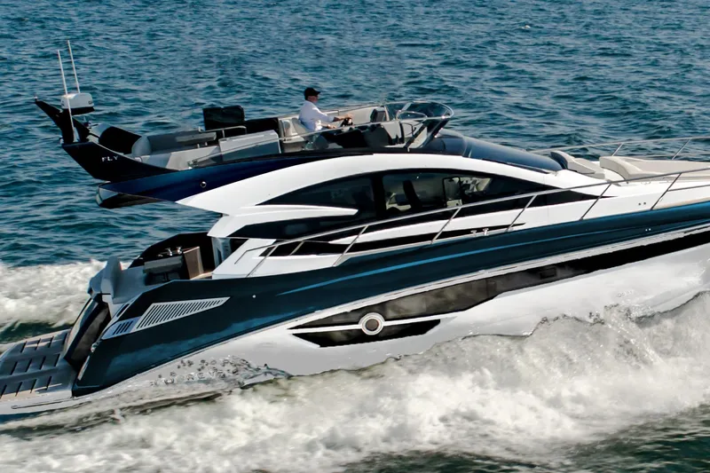 Custom Order Your 52 Fly Today! Yacht Photos Pics Luxury Cobrey 52 FLY yacht cruising on open water, 2026 model.