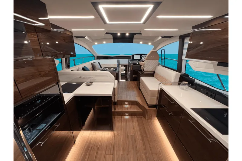 Custom Order Your 52 Fly Today! Yacht Photos Pics Luxurious interior of 2026 Cobrey 52 FLY yacht with modern design and ocean view.