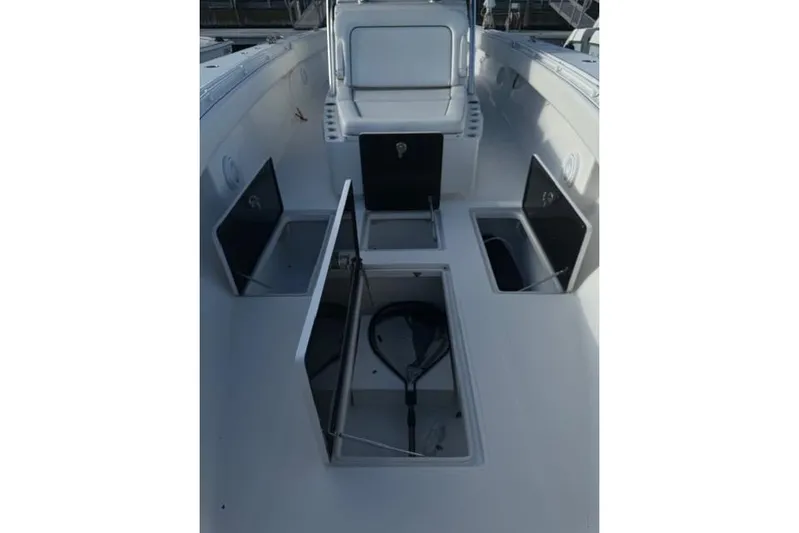  Yacht Photos Pics 2015 SeaHunter Center Console boat with open storage compartments.