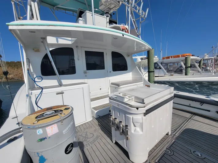  Yacht Photos Pics Custom Carolina 45 Willis Boatworks 1998, docked with fishing equipment on deck, clear sky background.