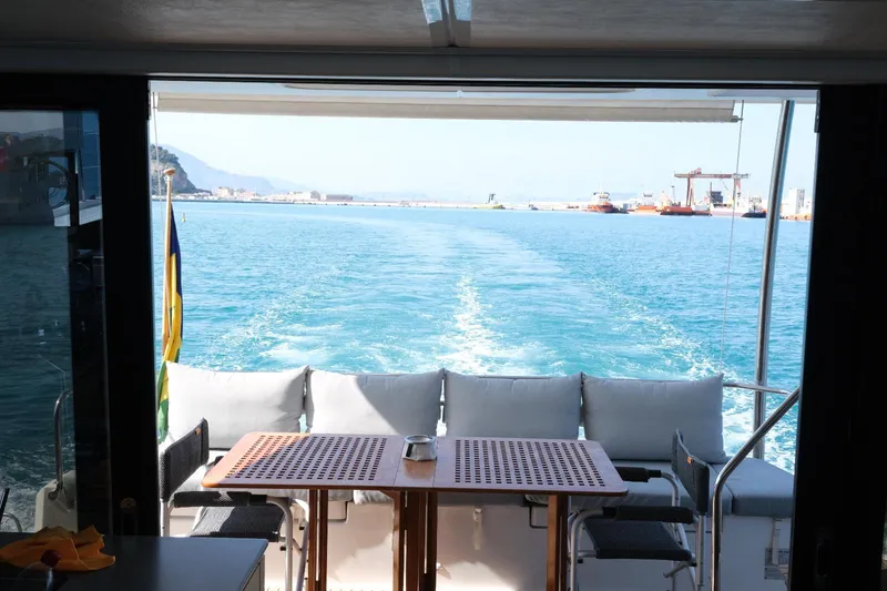  Yacht Photos Pics Aft deck view of 2020 Fountaine Pajot MY 44 yacht with ocean backdrop.