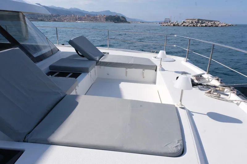  Yacht Photos Pics Luxurious 2020 Fountaine Pajot MY 44 yacht deck with sun loungers and ocean view.