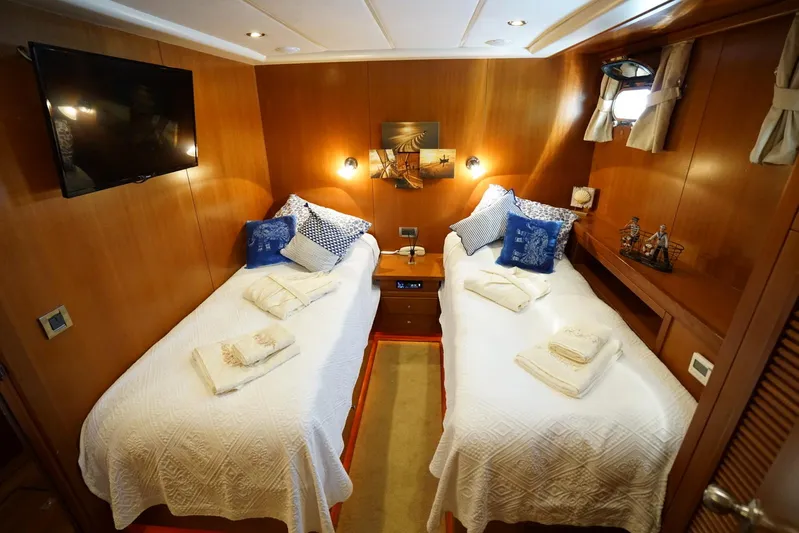  Yacht Photos Pics Luxurious twin cabin on a 2007 Custom 32 metre Gulet yacht, featuring elegant decor and amenities.