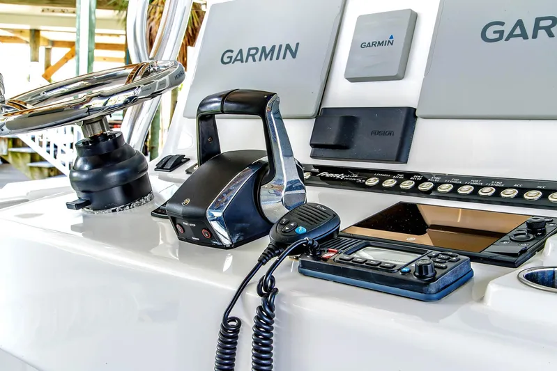  Yacht Photos Pics 2023 Front Runner 33 Center Console boat dashboard with Garmin electronics and controls.