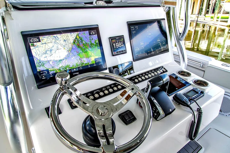  Yacht Photos Pics 2023 Front Runner 33 Center Console boat dashboard with advanced navigation displays.