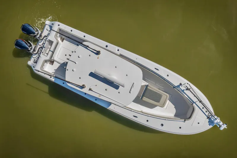  Yacht Photos Pics Aerial view of 2023 Front Runner 33 Center Console boat on water.