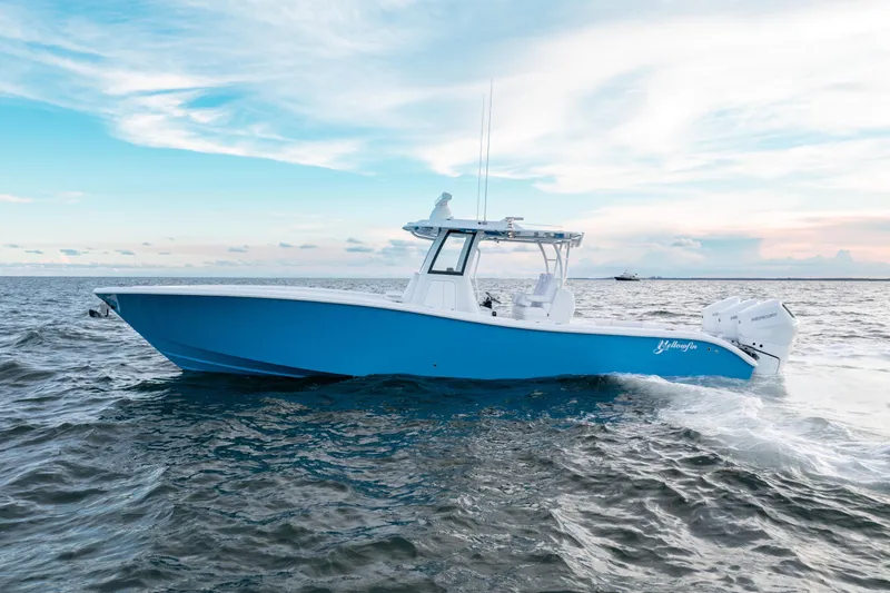  Yacht Photos Pics 2026 Yellowfin 36 Offshore boat cruising on open water under a clear sky.