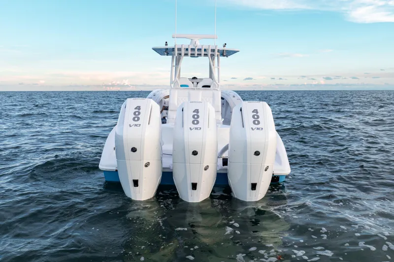  Yacht Photos Pics 2026 Yellowfin 36 Offshore boat with triple 400 V10 engines on open water.