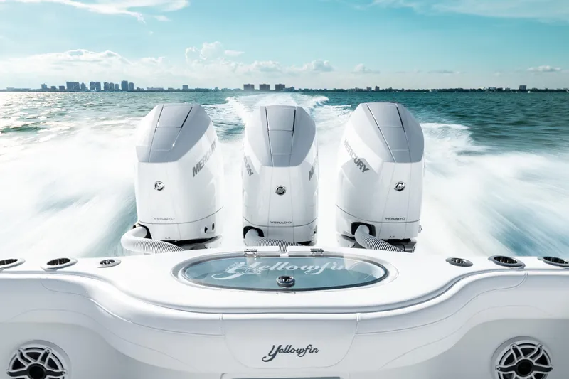  Yacht Photos Pics 2026 Yellowfin 36 Offshore boat with triple Mercury Verado engines on open water.