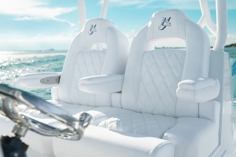  Yacht Photos Pics Luxurious white seating on 2026 Yellowfin 36 Offshore boat with ocean backdrop.