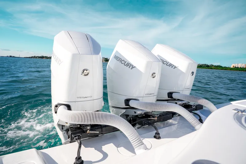  Yacht Photos Pics 2026 Yellowfin 36 Offshore boat with triple Mercury Verado engines on open water.