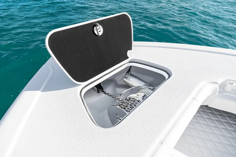  Yacht Photos Pics Open anchor compartment on 2026 Yellowfin 36 Offshore boat, with ocean background.
