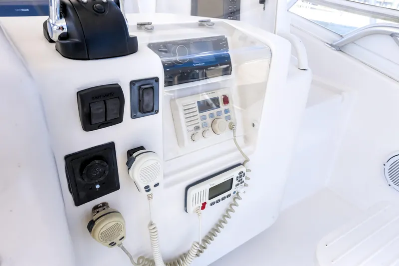  Yacht Photos Pics Control panel of a 2005 Bertram 450 Convertible yacht with communication equipment.