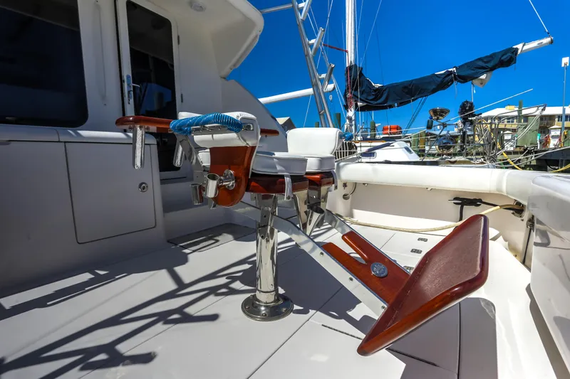  Yacht Photos Pics 2005 Bertram 450 Convertible yacht deck with fishing chair and equipment.