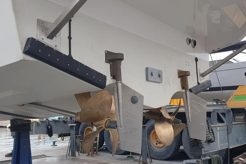 Cigale 8 Yacht Photos Pics 2023 Rio Yachts Daytona 50 boat propellers and rudders in a shipyard.