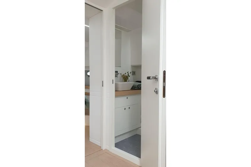 Cigale 8 Yacht Photos Pics Interior view of 2023 Rio Yachts Daytona 50, featuring a sleek, modern bathroom design.