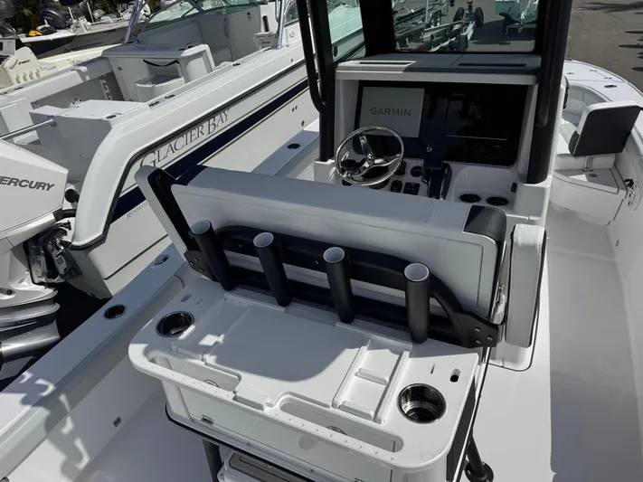  Yacht Photos Pics 2026 Blackfin 262 HB boat interior with Garmin navigation and rod holders.