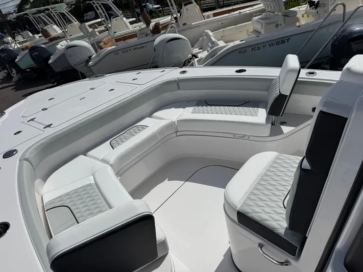  Yacht Photos Pics 2026 Blackfin 262 HB boat interior with luxurious seating and modern design.