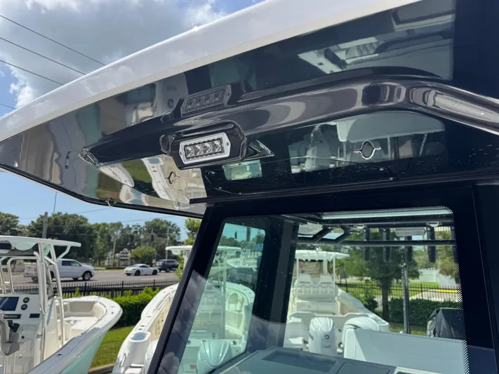  Yacht Photos Pics 2026 Blackfin 262 HB boat with modern lighting and sleek design.