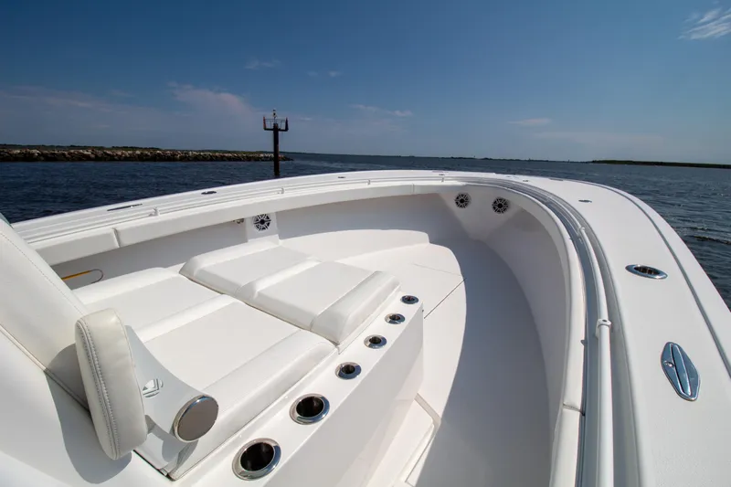 Reel Development Yacht Photos Pics 2022 Onslow Bay 41 TE boat with white seating, ocean view.