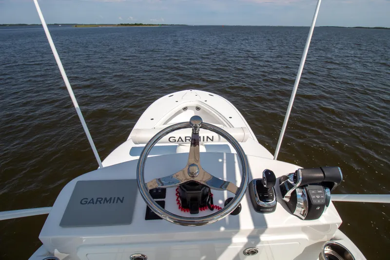 Reel Development Yacht Photos Pics Onslow Bay 41 TE 2022 boat helm with Garmin navigation on open water.