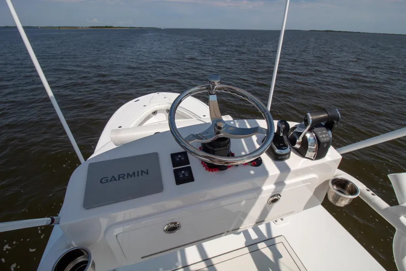 Reel Development Yacht Photos Pics Onslow Bay 41 TE 2022 boat helm with Garmin navigation on open water.