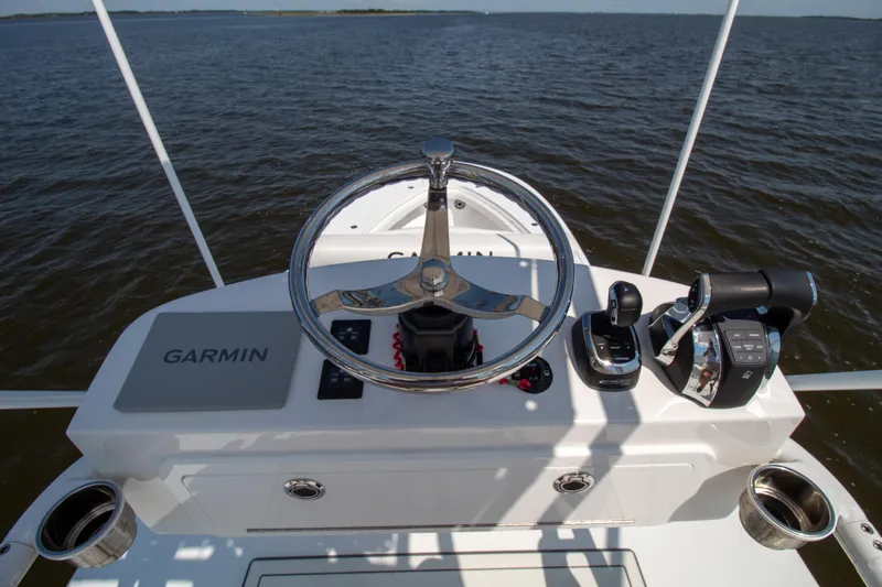 Reel Development Yacht Photos Pics Onslow Bay 41 TE 2022 boat helm with Garmin navigation system on open water.