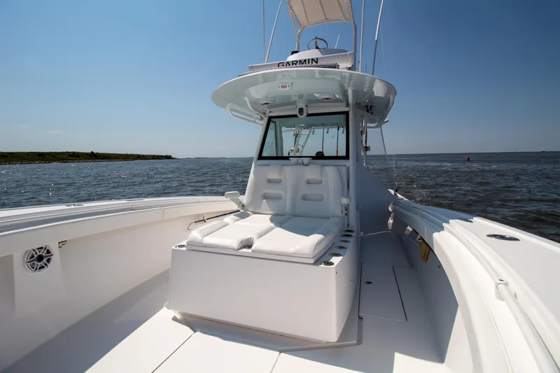 Reel Development Yacht Photos Pics 2022 Onslow Bay 41 TE boat on open water, featuring sleek white design.