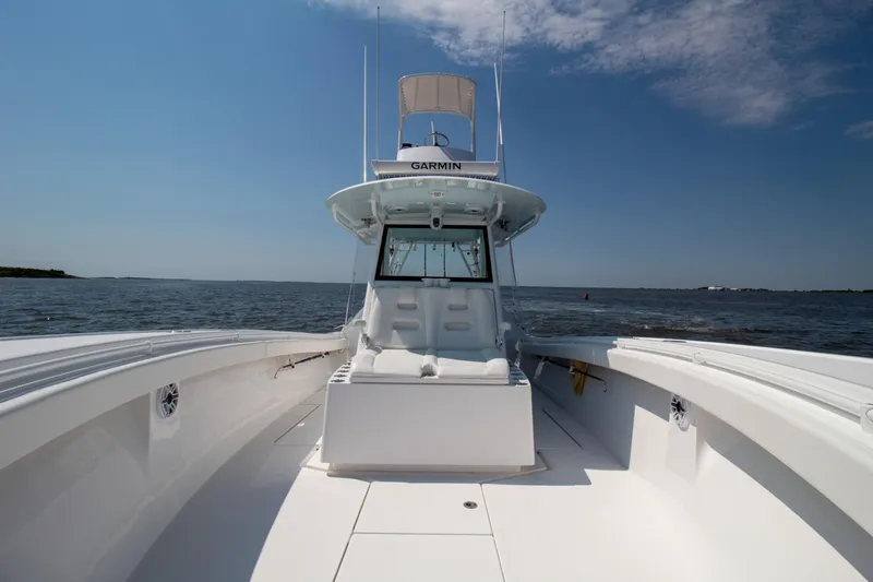 Reel Development Yacht Photos Pics 2022 Onslow Bay 41 TE boat on open water under clear sky.