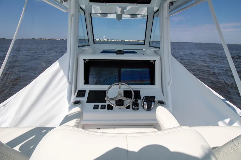 Reel Development Yacht Photos Pics 2022 Onslow Bay 41 TE boat helm with modern controls and ocean view.