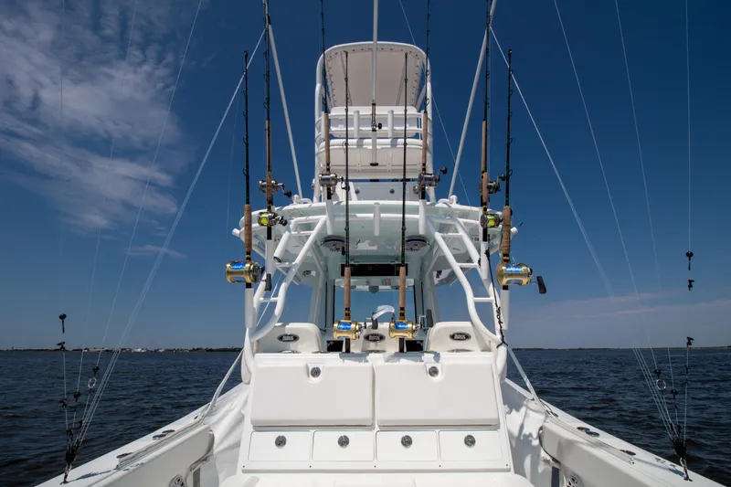 Reel Development Yacht Photos Pics 2022 Onslow Bay 41 TE boat with fishing rods on open water.