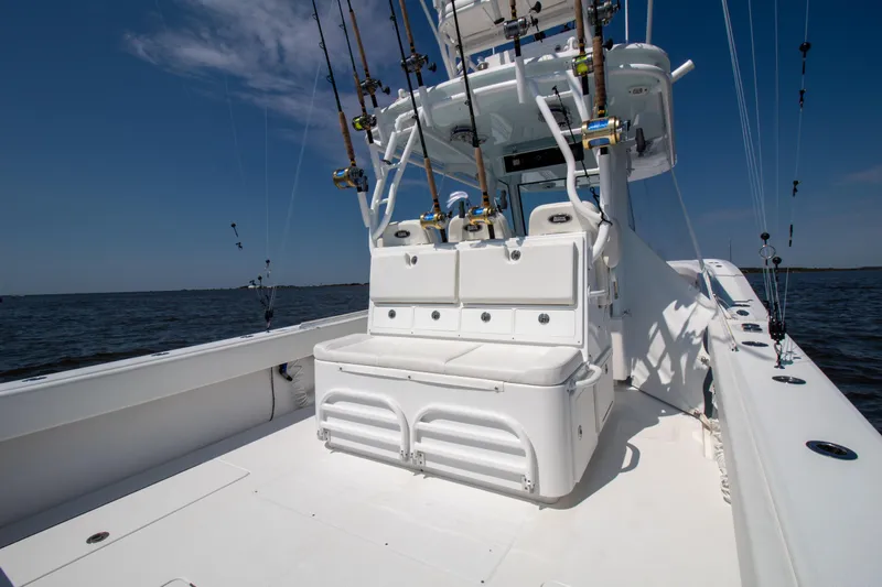 Reel Development Yacht Photos Pics 2022 Onslow Bay 41 TE fishing boat with multiple rods on a sunny day.