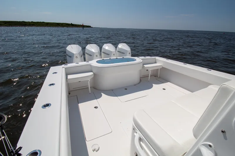 Reel Development Yacht Photos Pics 2022 Onslow Bay 41 TE boat with four Mercury engines on open water.