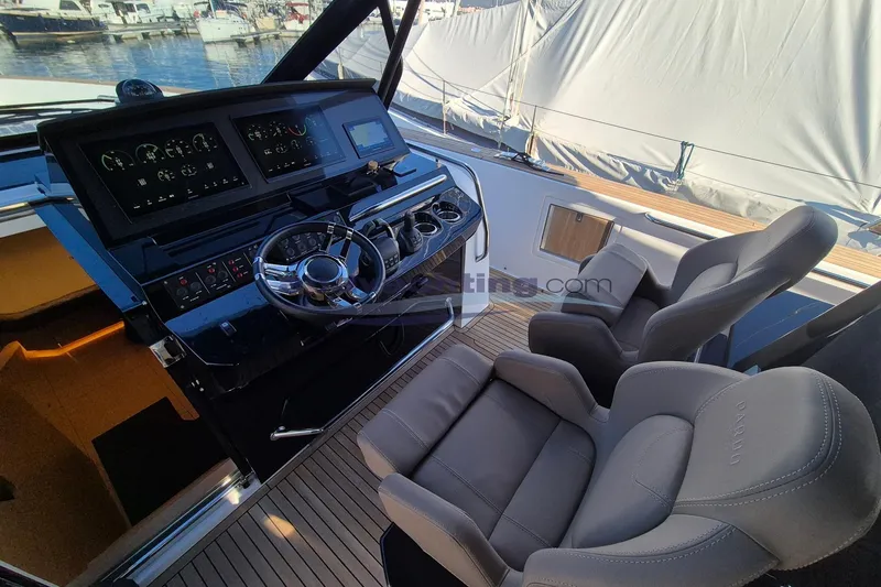  Yacht Photos Pics Luxurious 2022 Pardo Yachts 50 cockpit with modern steering and comfortable seating.