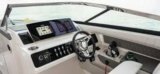  Yacht Photos Pics 2024 Sea Ray SLX 310 OB boat dashboard with modern controls and steering wheel.