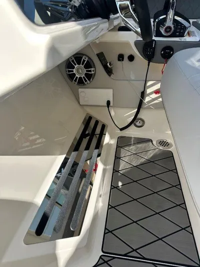  Yacht Photos Pics 2024 Sea Ray SLX 310 OB interior with modern controls and sleek design.