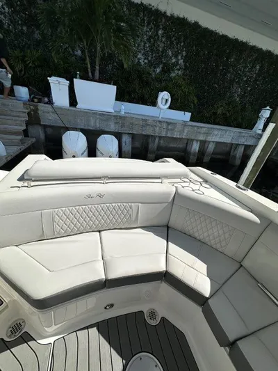  Yacht Photos Pics 2024 Sea Ray SLX 310 OB boat with luxurious seating and elegant design.