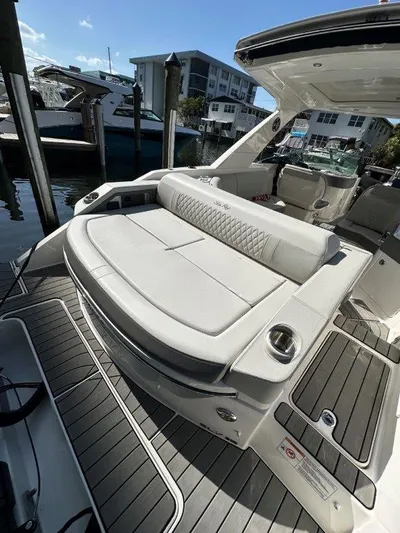  Yacht Photos Pics 2024 Sea Ray SLX 310 OB luxury boat with spacious seating and modern design.