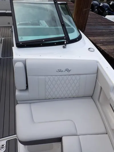  Yacht Photos Pics 2024 Sea Ray SLX 310 OB boat with luxurious seating and sleek design.