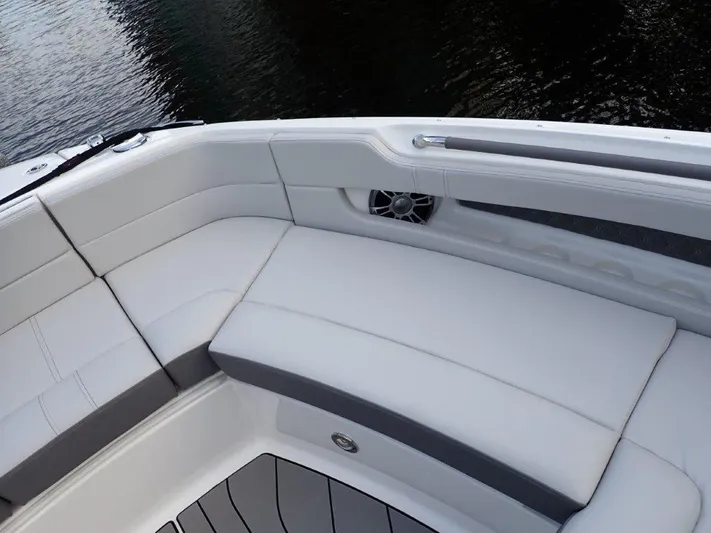  Yacht Photos Pics 2024 Sea Ray SLX 310 OB boat interior with white cushioned seating.