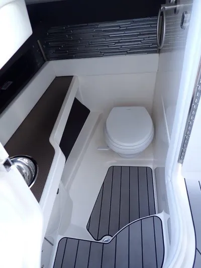  Yacht Photos Pics 2024 Sea Ray SLX 310 OB boat interior with modern bathroom amenities.