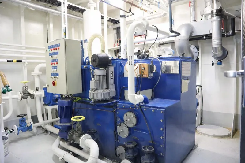  Yacht Photos Pics Engine room of 2008 De Donge Long Range 48M yacht, featuring complex machinery and piping.