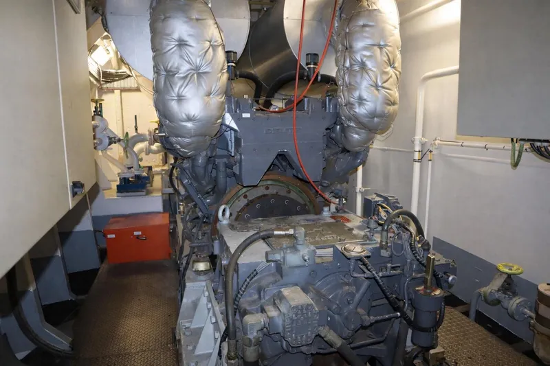  Yacht Photos Pics Engine room of 2008 De Donge Long Range 48M yacht, featuring complex machinery and piping.