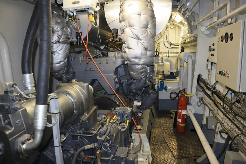  Yacht Photos Pics Engine room of 2008 De Donge Long Range 48M yacht, featuring complex machinery and control panels.