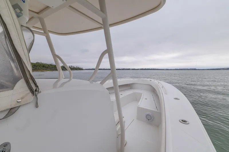  Yacht Photos Pics 2008 Jupiter 31 FS boat on calm waters under overcast sky.
