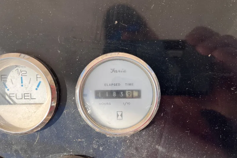  Yacht Photos Pics Close-up of Silverton 42C 2001 boat gauges showing fuel level and elapsed time.