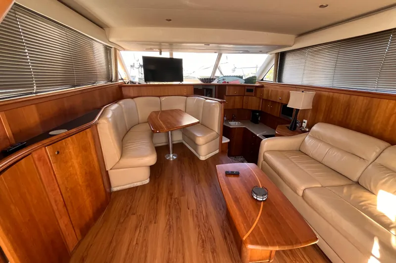  Yacht Photos Pics Luxurious interior of 2001 Silverton 42C yacht with leather seating and wooden finishes.