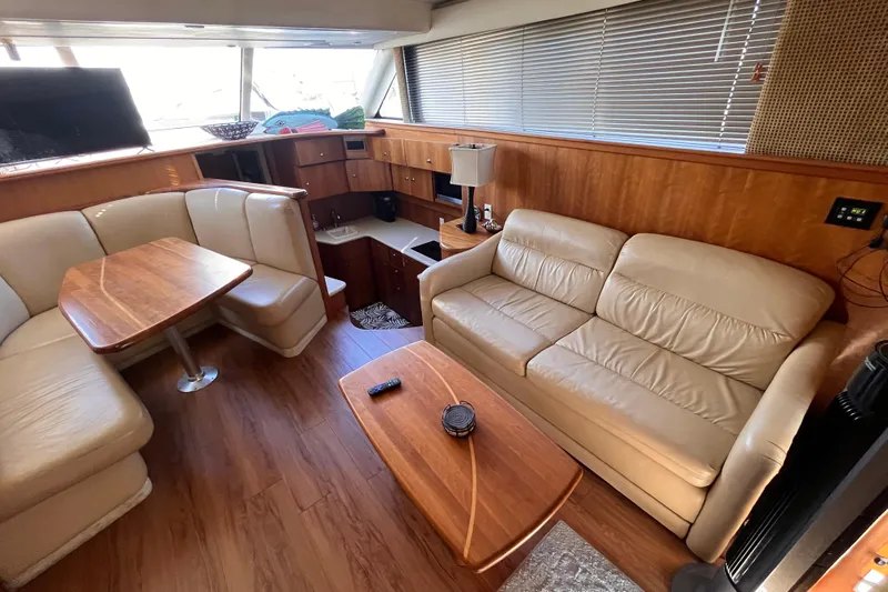  Yacht Photos Pics Interior of 2001 Silverton 42C yacht with leather seating and wooden finishes.
