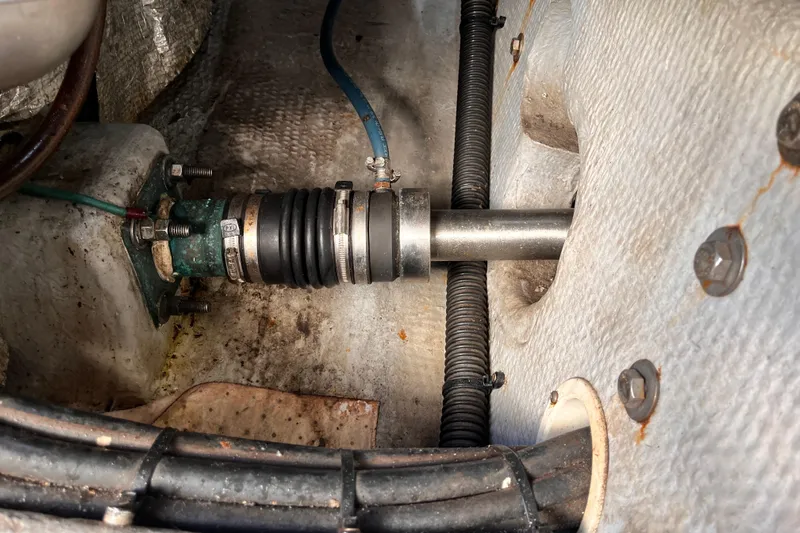  Yacht Photos Pics Engine compartment of a 2001 Silverton 42C boat, showing mechanical components and fittings.